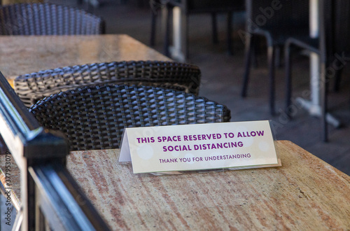 Social Distancing Signs on Tables at a Fort Lauderdale Restaurant