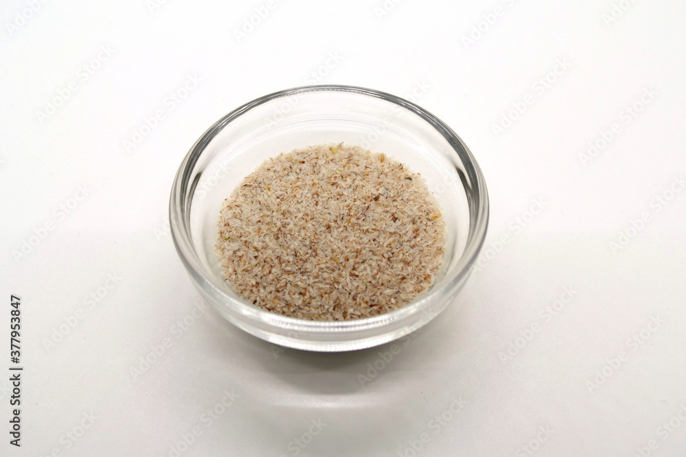 psyllium seeds in a transparent bowl, detailed view in a photo box psyllium seeds in a transparent bowl, detailed view in a photo box