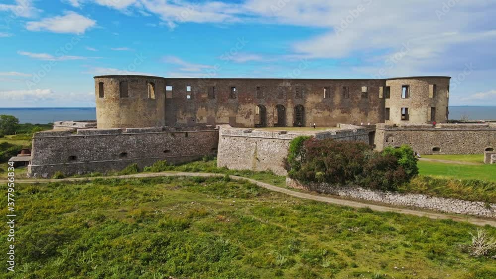 Famous Borgholm Castle Reveals The Seascape Under The Blue Sky In Borgholm, Öland, Sweden. - Panning Shot Famous Borgholm Castle Reveals The Seascape Under The Blue Sky In Borgholm, Öland, Sweden. - Panning Shot