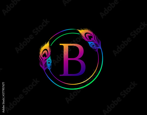 B Letter Decorated With Exotic Peacock Feather. Circle Badge With Peacock Feather.