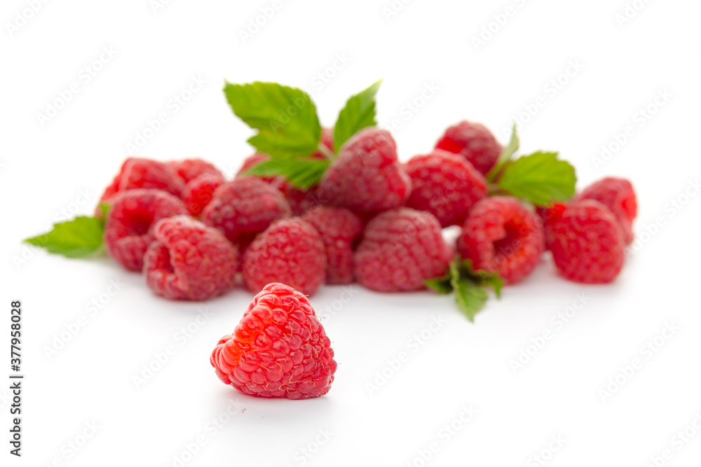 raspberries with leaf isolated on a white background raspberries with leaf isolated on a white background