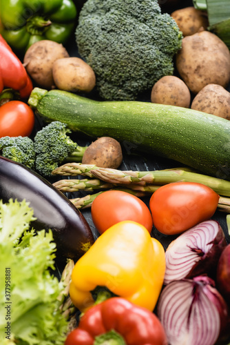 selective focus of ripe colorful vegetables, background 