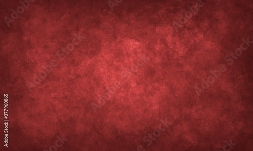 dark red abstract grunge background with darkened edges and light space in the center. Classic, simple , textured background