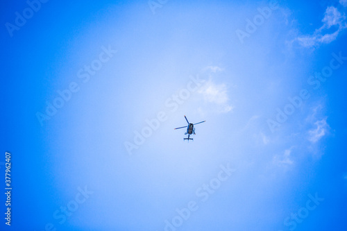 helicopter in the blue sky