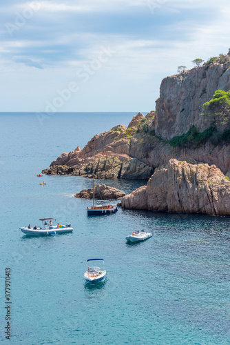 View of Sant Pol beach in the village of Sant Feliu de Guixols at Costa Brava in Catalonia, Spain photo