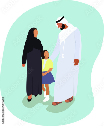 Traditional Emirati young family enjoying the weekend outdoor during a sunny day. man in front wearing the dishdash traditional wear, the woman wearing the traditional abaya all black dress from uae