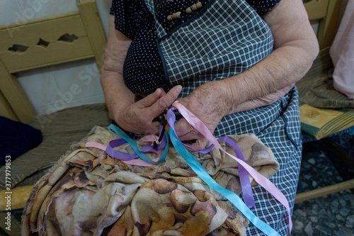 older woman's hands while playing the castanets