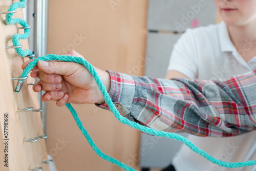 Fotografie Man in occupational therapy with therapist training his dexterity