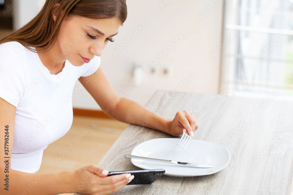 Woman holding smartphone, typing message, chatting with friends in social networks Woman holding smartphone, typing message, chatting with friends in social networks