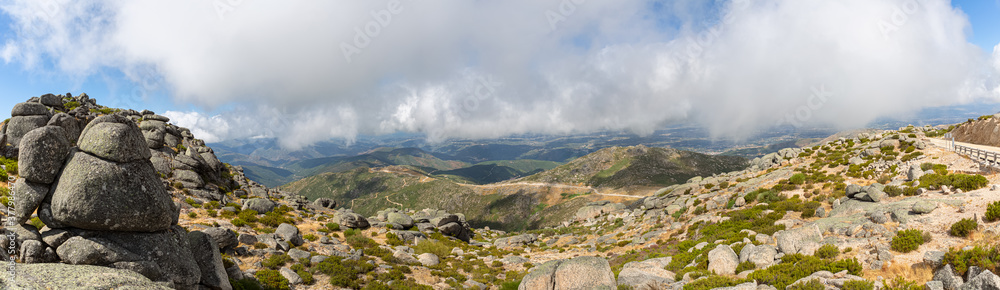 View from the top of the mountains of the Serra da Estrela natural park, Star Mountain Range, low clouds and mountain landscape