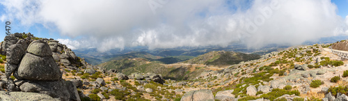 View from the top of the mountains of the Serra da Estrela natural park, Star Mountain Range, low clouds and mountain landscape © Miguel Almeida