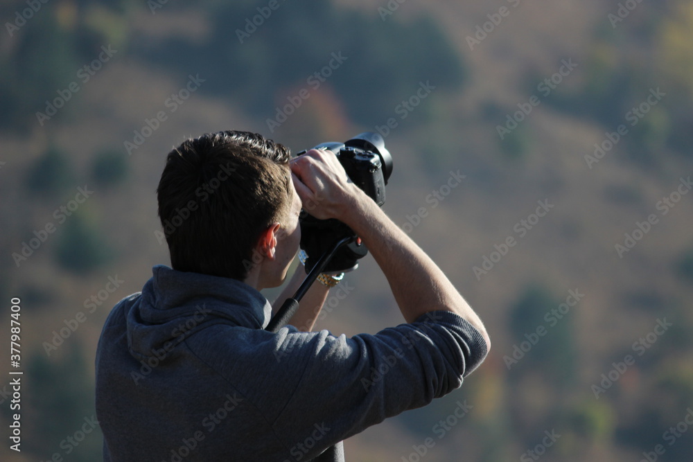 A young photographer. Photo-video filming in nature. A young photographer. Photo-video filming in nature.