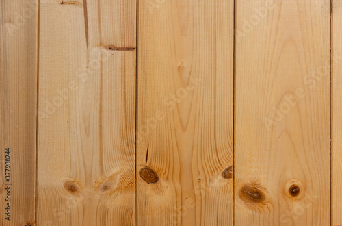 Wood-colored background with vertical stripes