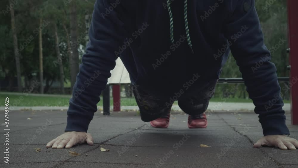 Man Doing Push-Ups On Floor Man Doing Push-Ups On Floor