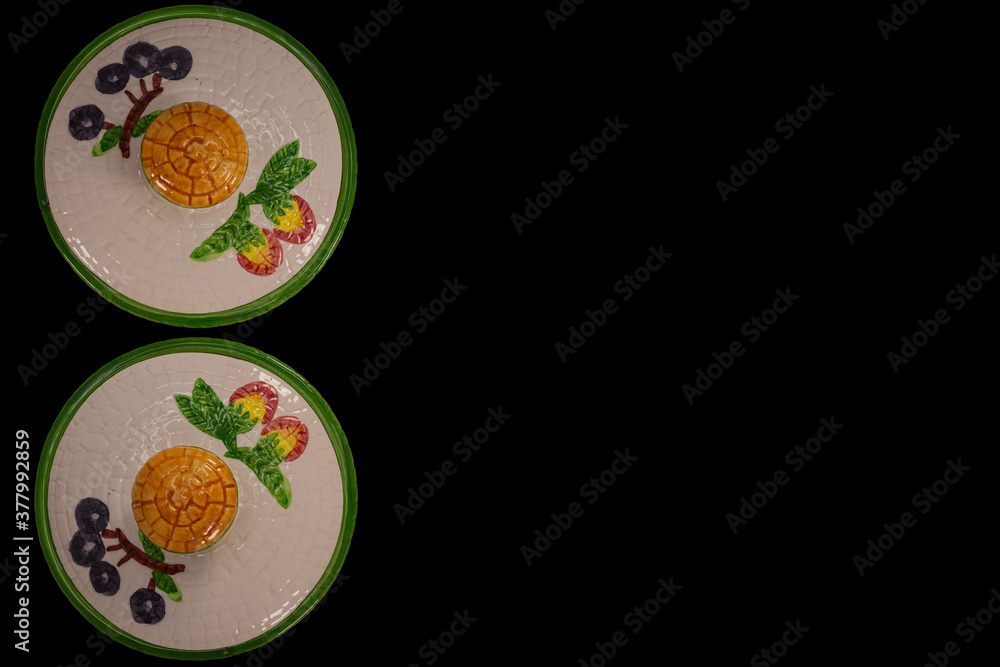 Teapot lids isolated on black background Teapot lids isolated on black background
