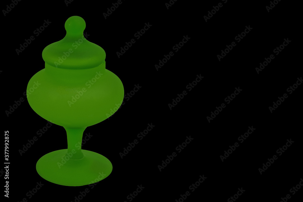 Perfume container isolated on black background Perfume container isolated on black background