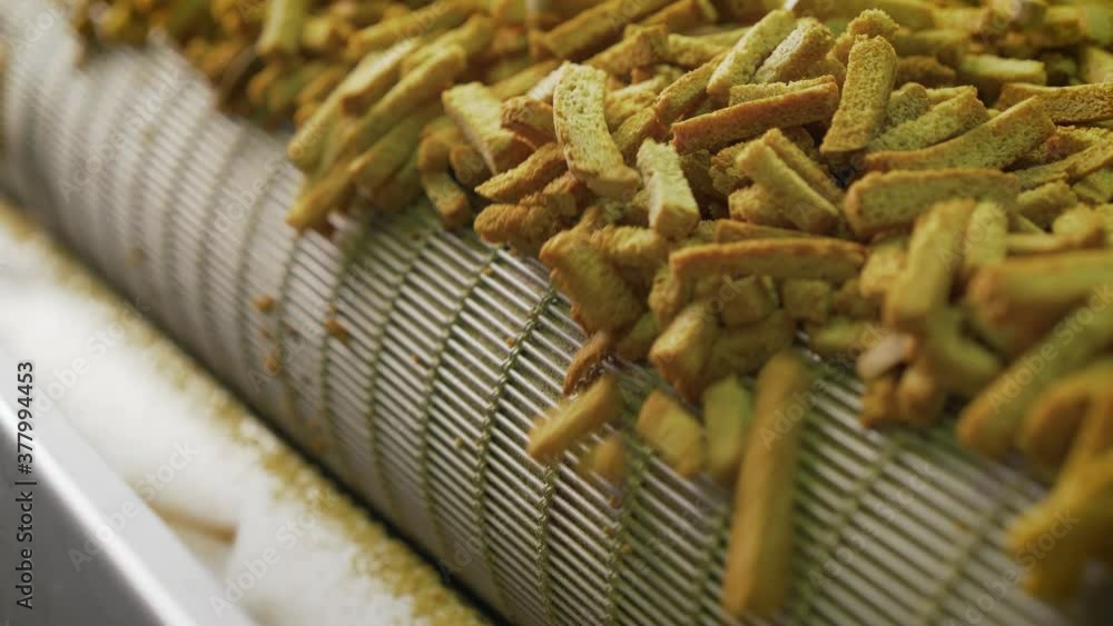 The process of making crackers. Cracker production. Croutons on the