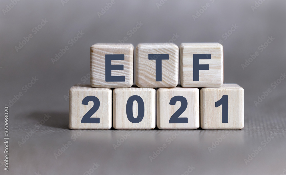ETF text on wooden cubes on a monochrome background ETF text on wooden cubes on a monochrome background