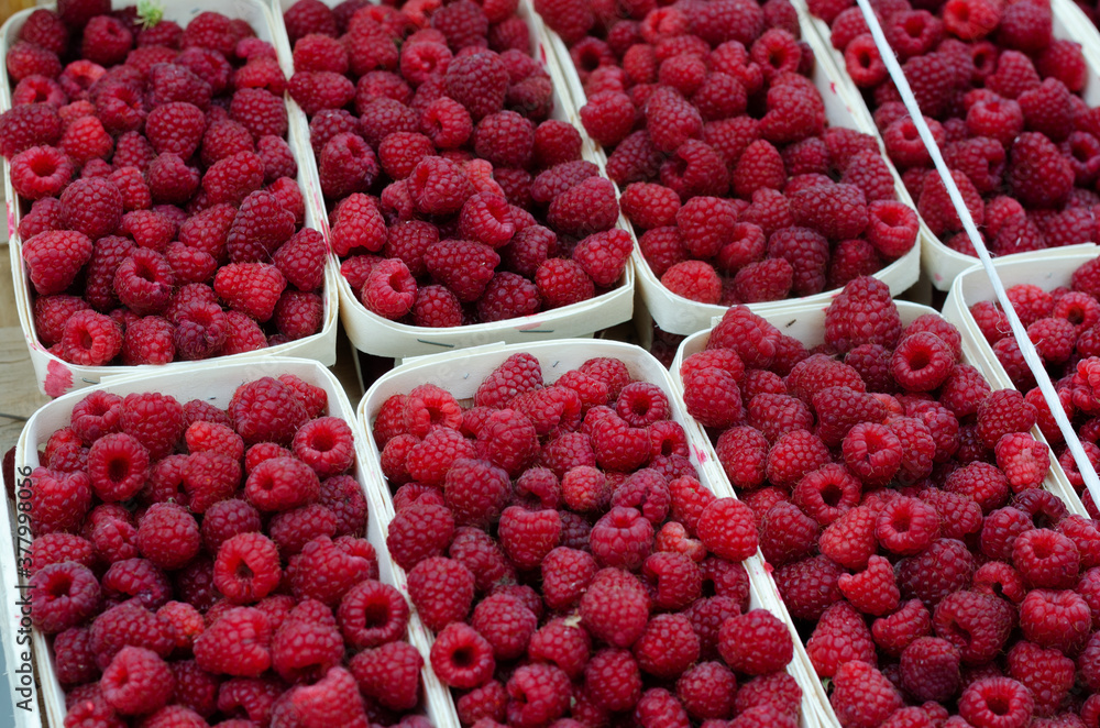 ripe raspberries on the counter in the store ripe raspberries on the counter in the store