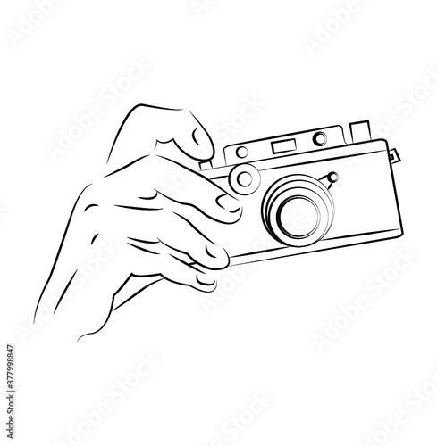 Retro camera in hand
