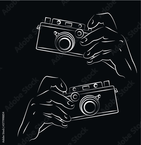 Retro camera in hand
