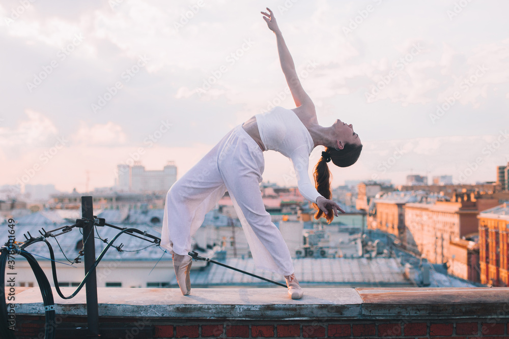 Fototapeta premium rhythmic gymnastics on the street