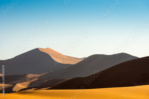 the dunes of namibia at sunrise