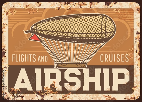 Airship flights and cruises rusty metal plate, vector vintage zeppelin rust tin sign, retro poster, air tours advertising or invitation grunge card. Antique blimp with red flag floating in cloudy sky