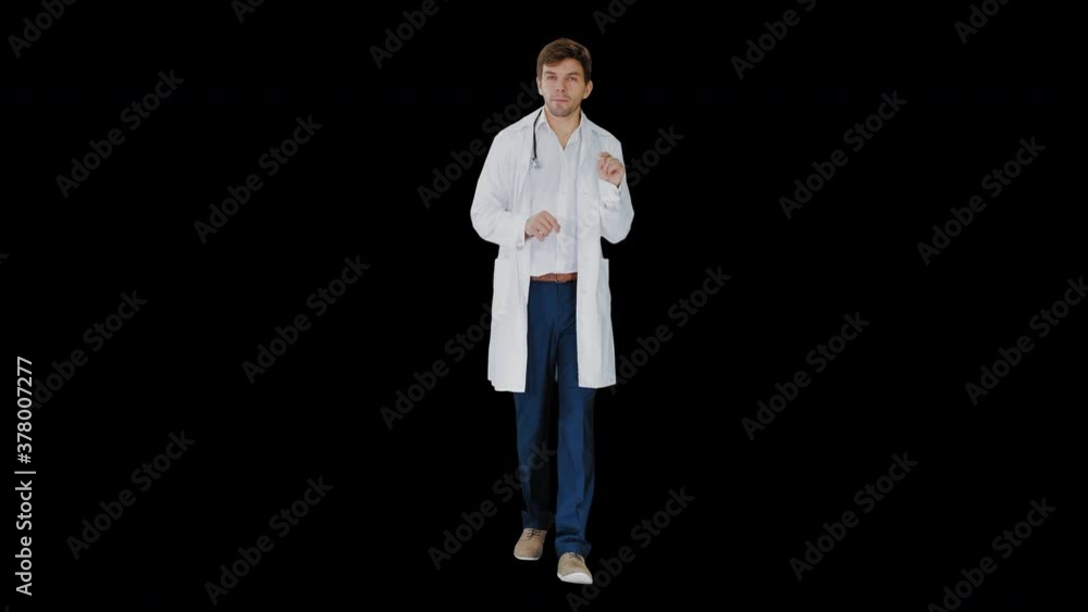 Doctor talking to camera while walking, Alpha Channel Doctor talking to camera while walking, Alpha Channel