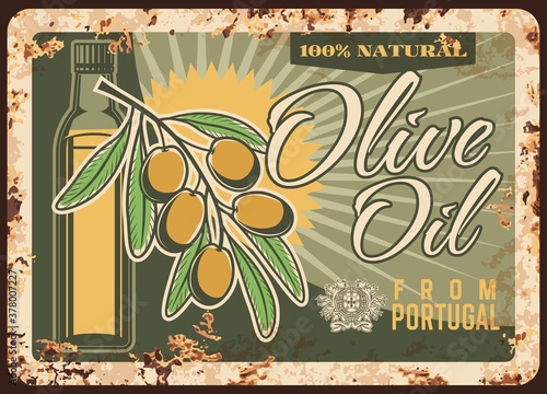 Olive oil from Portugal rusty metal plate, vector fresh natural oil. Ripe olives on branch and glass bottle vintage rust tin sign, promo ad for market or store. Portuguese ingredient for meals cooking