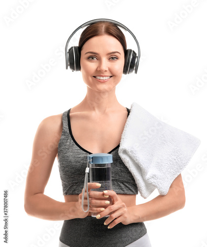 Sporty young woman with bot...