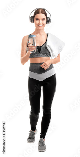 Sporty young woman with bot...