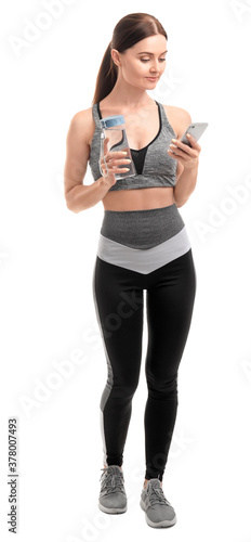 Sporty young woman with bot...