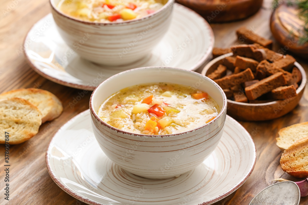 Bowl of tasty rice soup on table Bowl of tasty rice soup on table