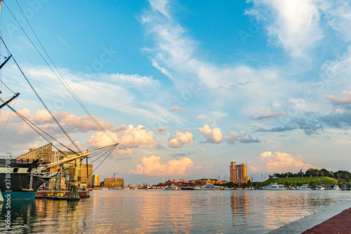 Baltimore, Maryland, US - September 4, 2019 View of Baltimore Harbor with buildings, yacht and boat