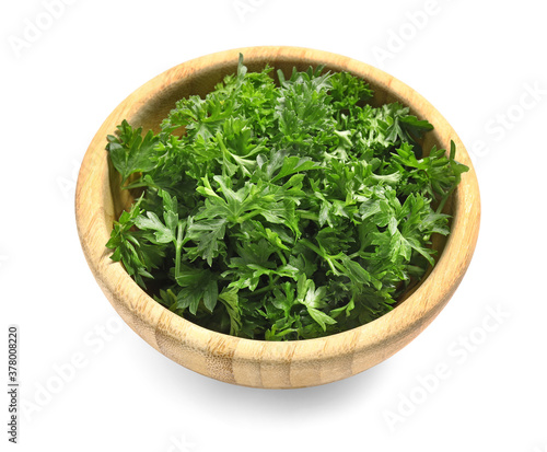 Fresh parsley in bowl on white background