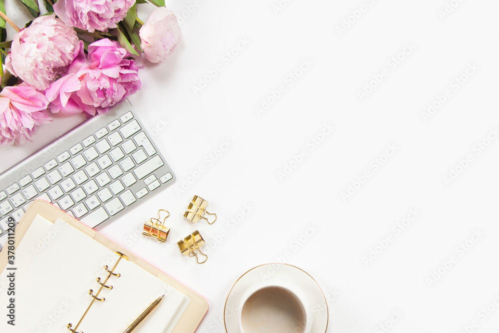 Top view of stylish office desk accessories with keyboard and cup of  cappuccino on the gold tray. Stock-Foto | Adobe Stock