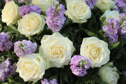 White and purple wedding centerpiece