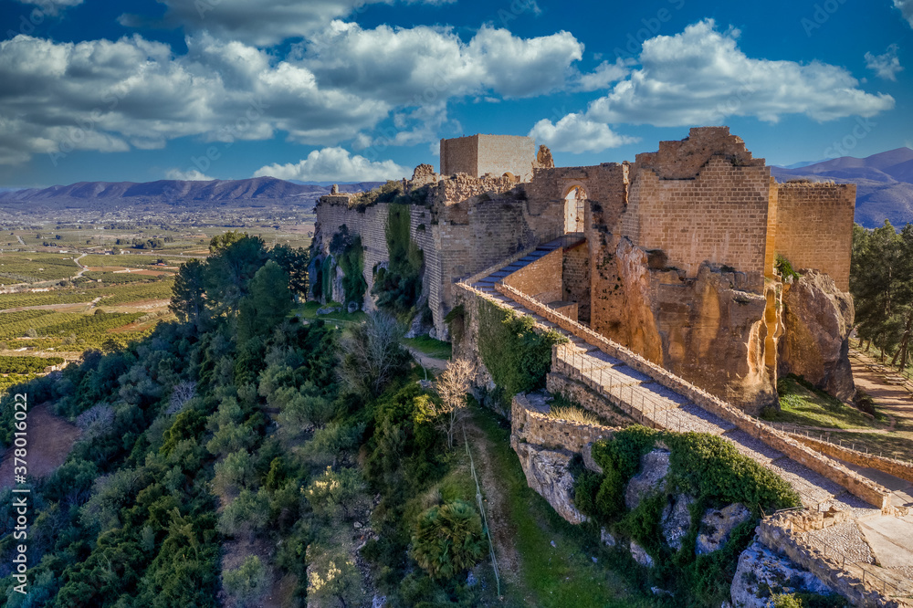 Aerial view of Montesa castle near Valencia Spain former stronghold of the crusader knights with ramp leading up to the gate and a ruined knights hall