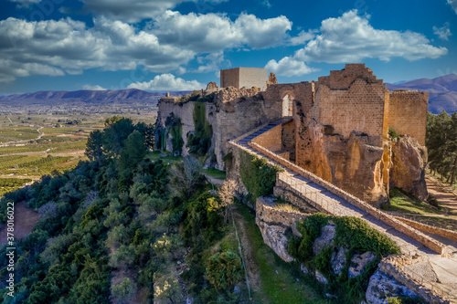Aerial view of Montesa castle near Valencia Spain former stronghold of the crusader knights with ramp leading up to the gate and a ruined knights hall photo