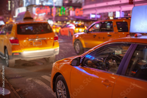 New York City yellow taxi at night © bartsadowski