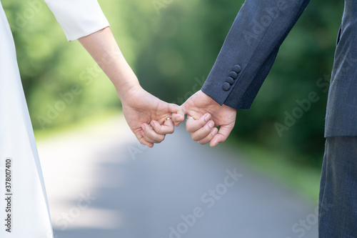  Beautiful Asian lovers holding hands