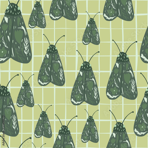 Random night moth print seamless pattern. Butterfly hand drawn green elements on pale yellow chequered background. photo