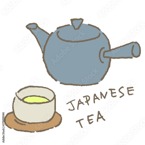 湯飲みに入った緑茶と急須