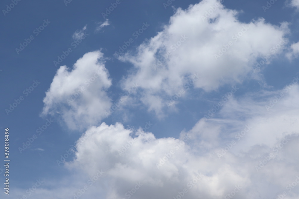 Blue sky and white cloud background closeup with copy space. Nature create very beautifully.