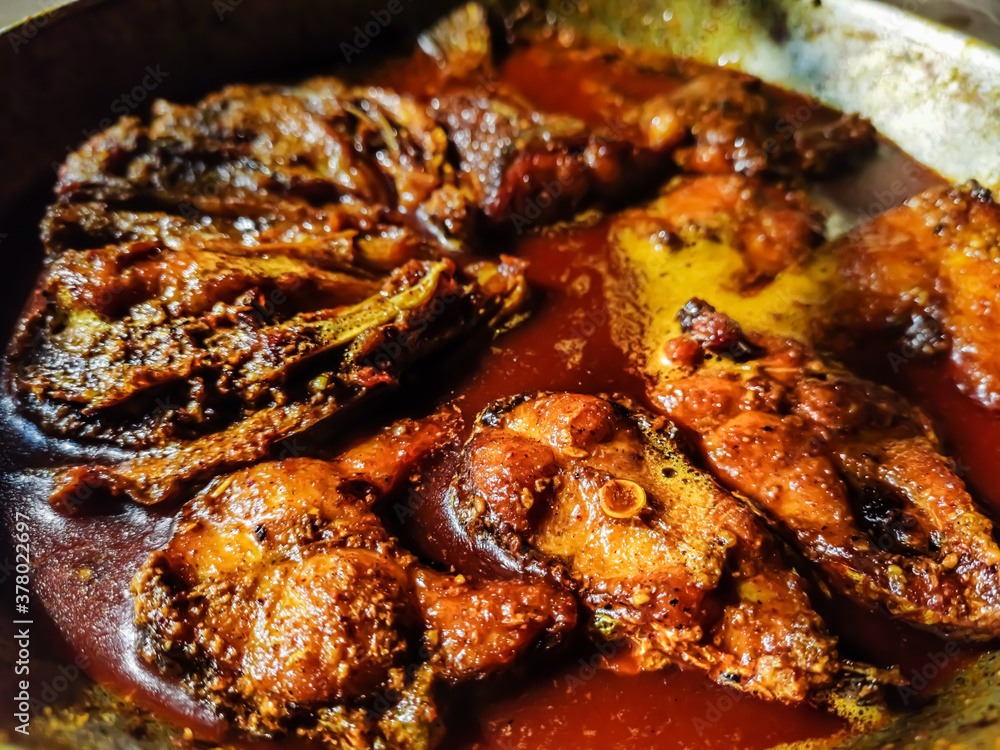 A fish curry made in a vary rural way on a winter afternoon in India.