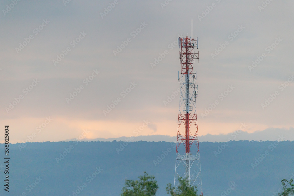 Telephone network towers on Khao Yai national park background mountain in silhouette. radar towers