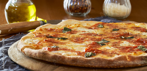 Wallpaper Mural neapolitan style margherita pizza on wooden peel Torontodigital.ca