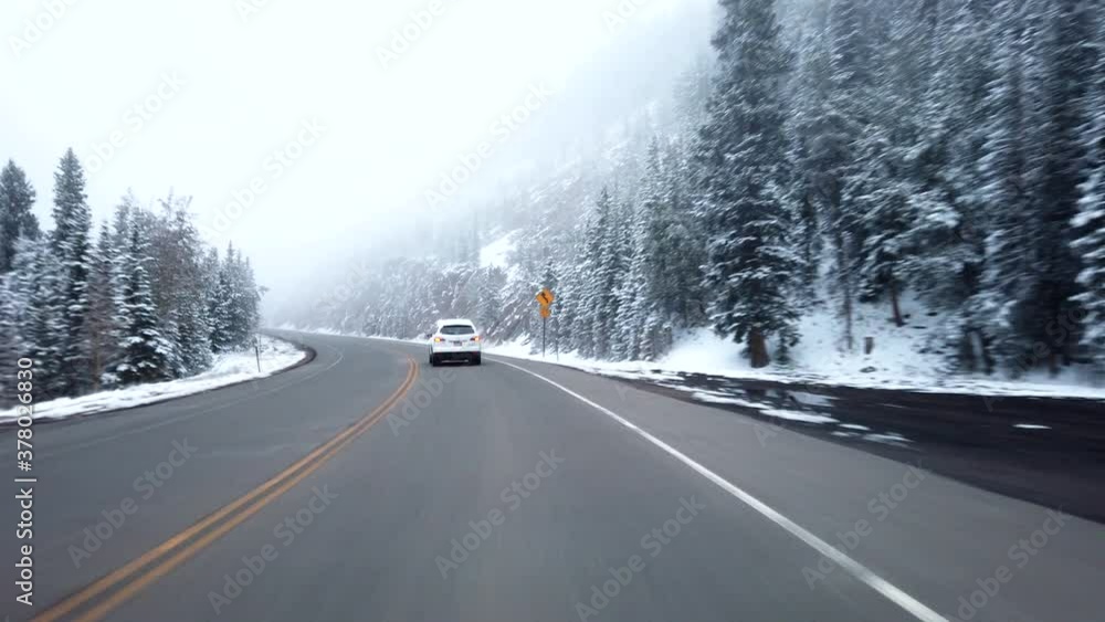 POV driving in the Rocky Mountains of Colorado after an early snow storm in September POV driving in the Rocky Mountains of Colorado after an early snow storm in September