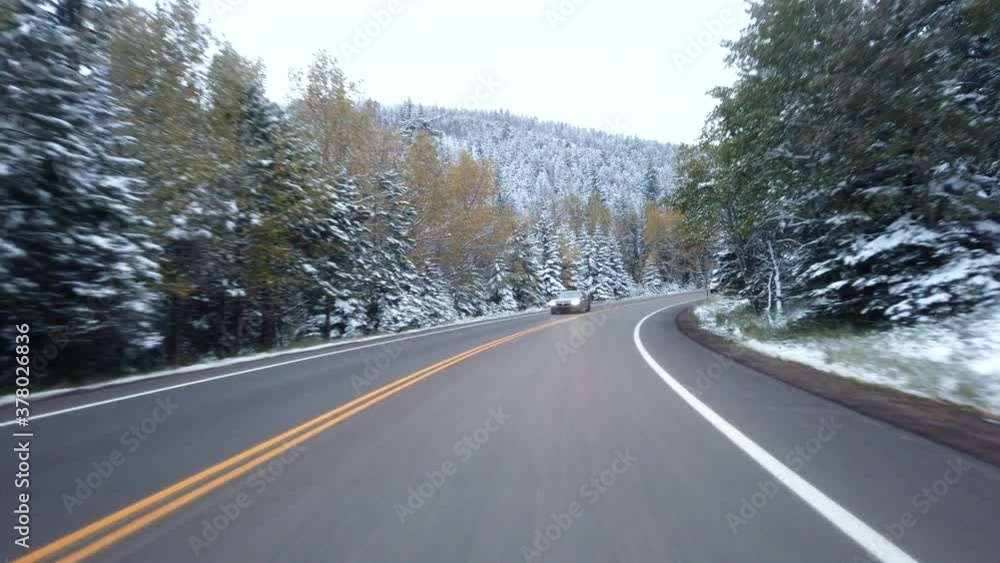 POV driving in the Rocky Mountains of Colorado after an early snow storm in September POV driving in the Rocky Mountains of Colorado after an early snow storm in September